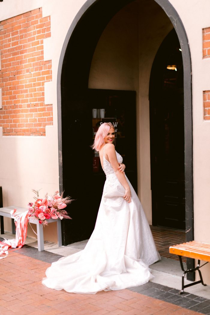 Real Bride at Pink Wedding Wearing A-line Wedding Gown Called Chad by Sottero and Midgley