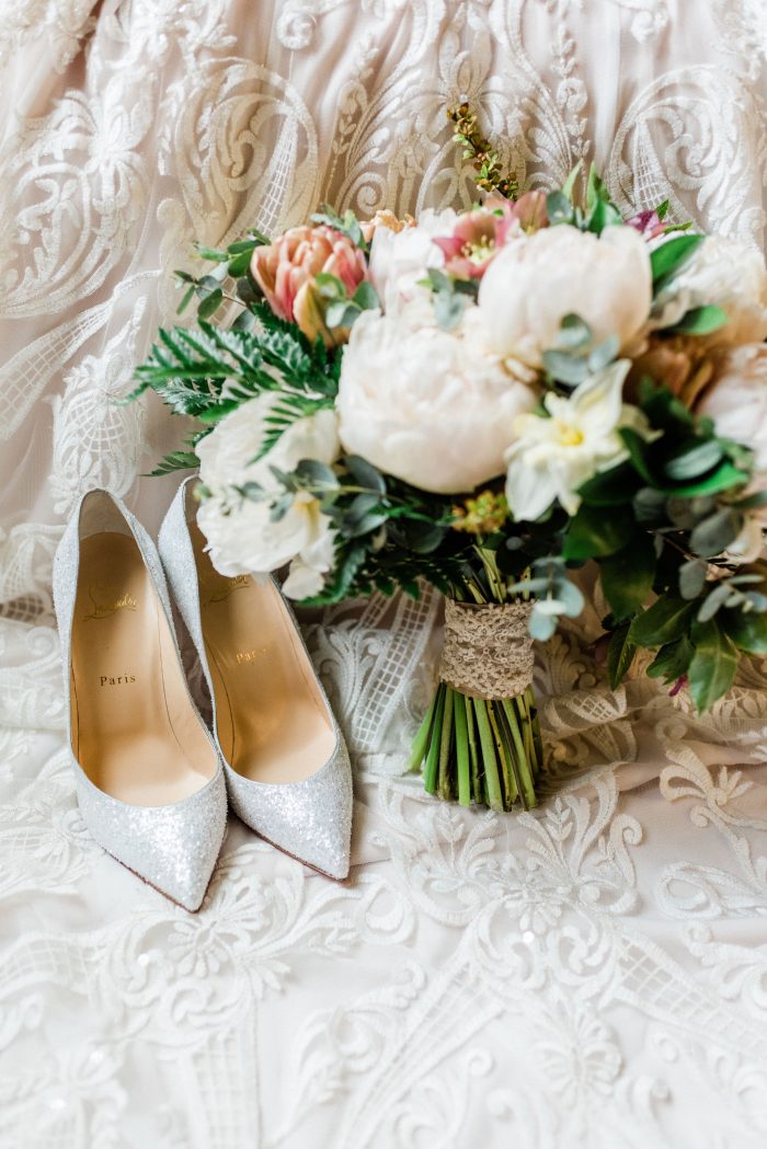 Blue Shimmery Wedding Shoes with Bridal Bouquet of Flowers