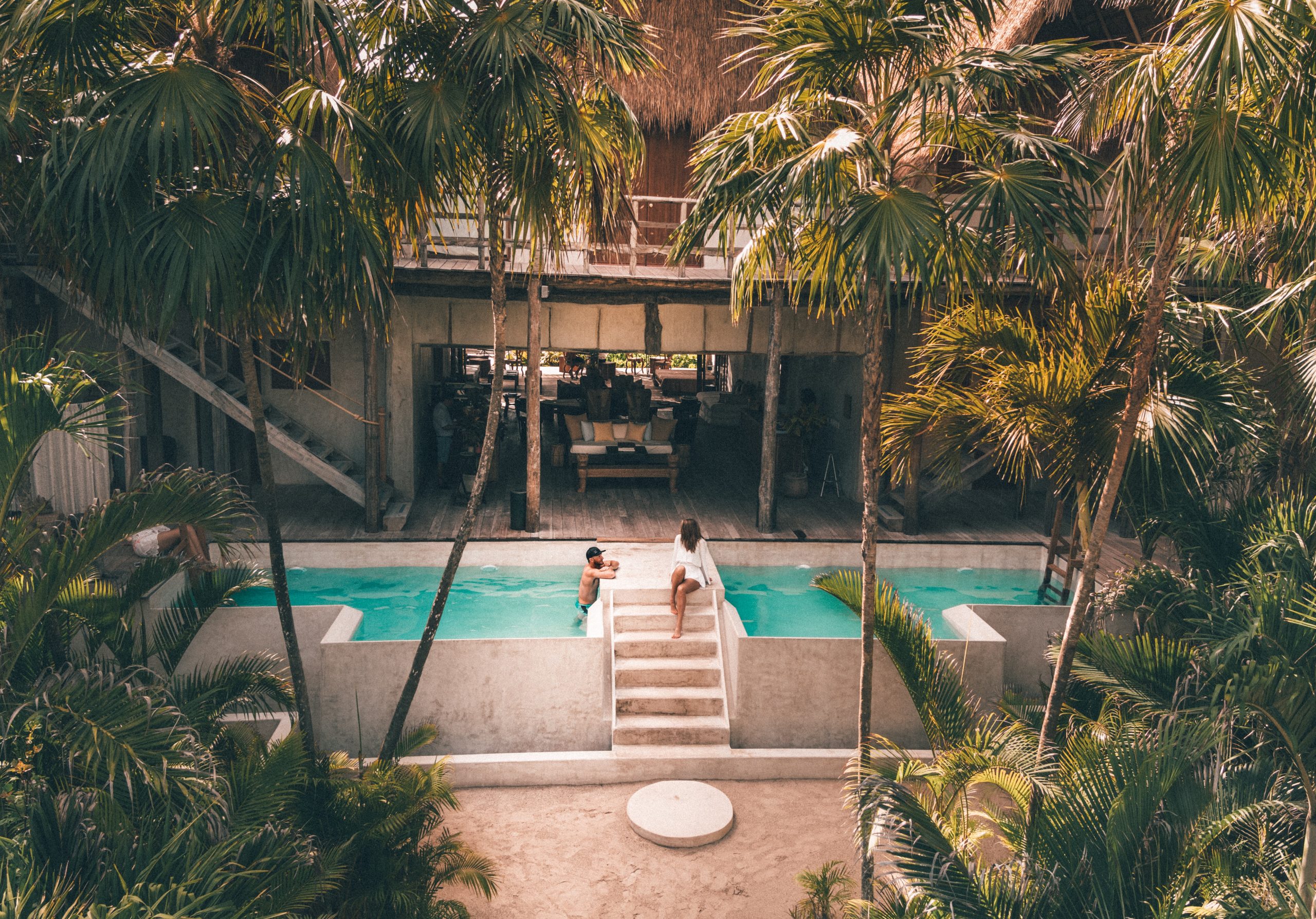 Couple Sitting in Tulum, Mexico on Honeymoon