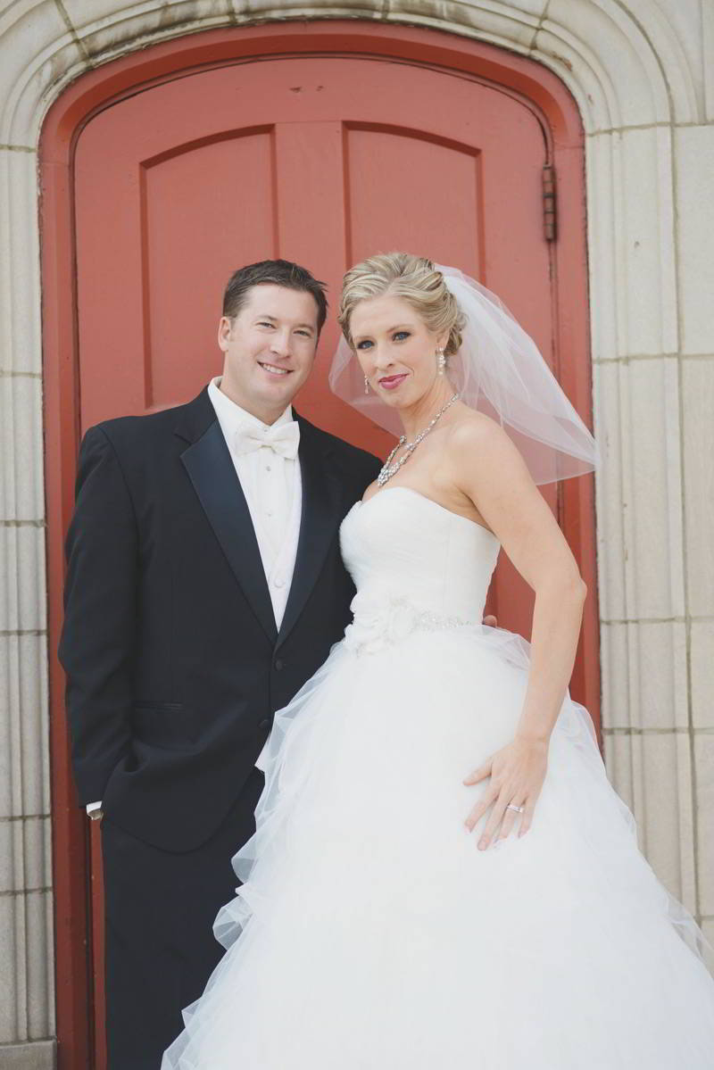 Groom with Real Bride Wearing Strapless Ball Gown Wedding Dress by Maggie Sottero