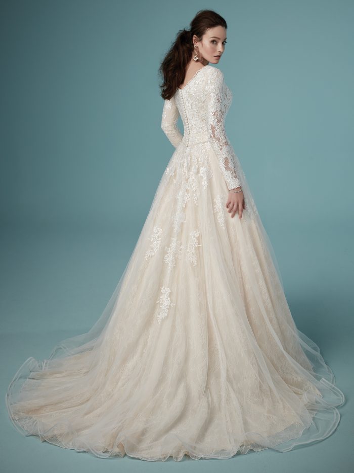 Model Wearing Unique Modest A-line Wedding Gown called Shiloh Leigh by Maggie Sottero