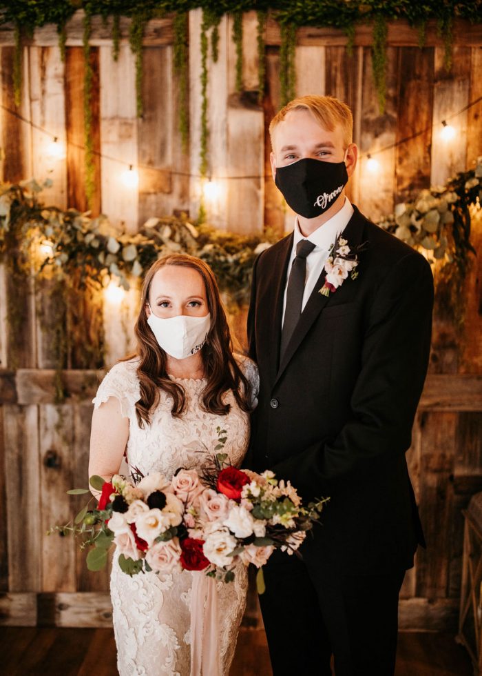 Groom and Bride Wearing Mask and Modest Cap Sleeve Lace Wedding Dress at Wedding During Covid