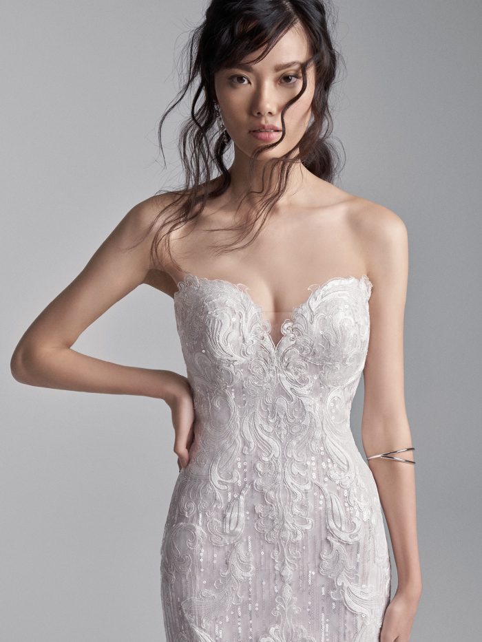 Model Wearing Strapless Lace Mermaid Wedding Gown Called Conrad by Sottero and Midgley