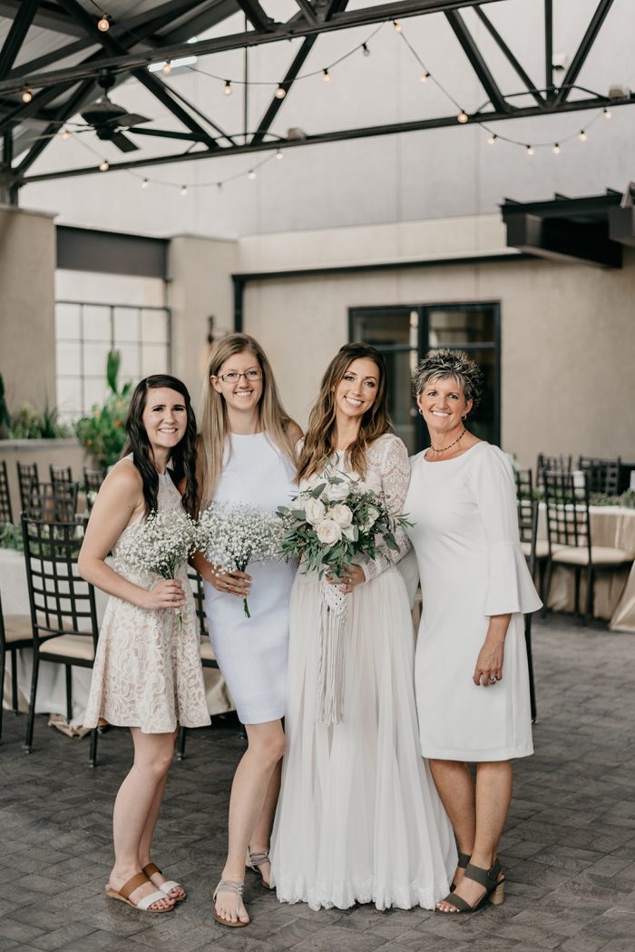 Mother of the Bride Wearing Off White Bell Sleeve Dress with Real Maggie Bride