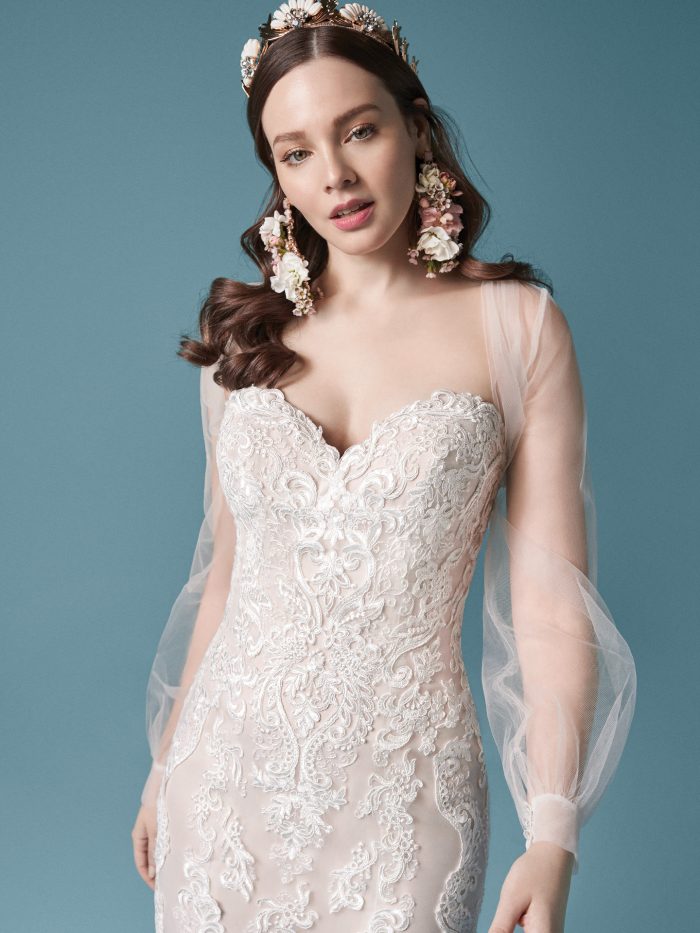 Model Wearing Lace Fit-and-Flare Wedding Dress with Illusion Sleeves Called Clarette by Maggie Sottero