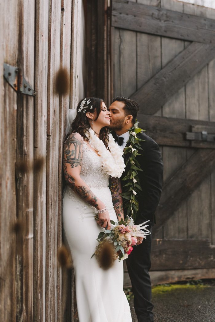 Groom Kissing Bride During Bridal Shoot