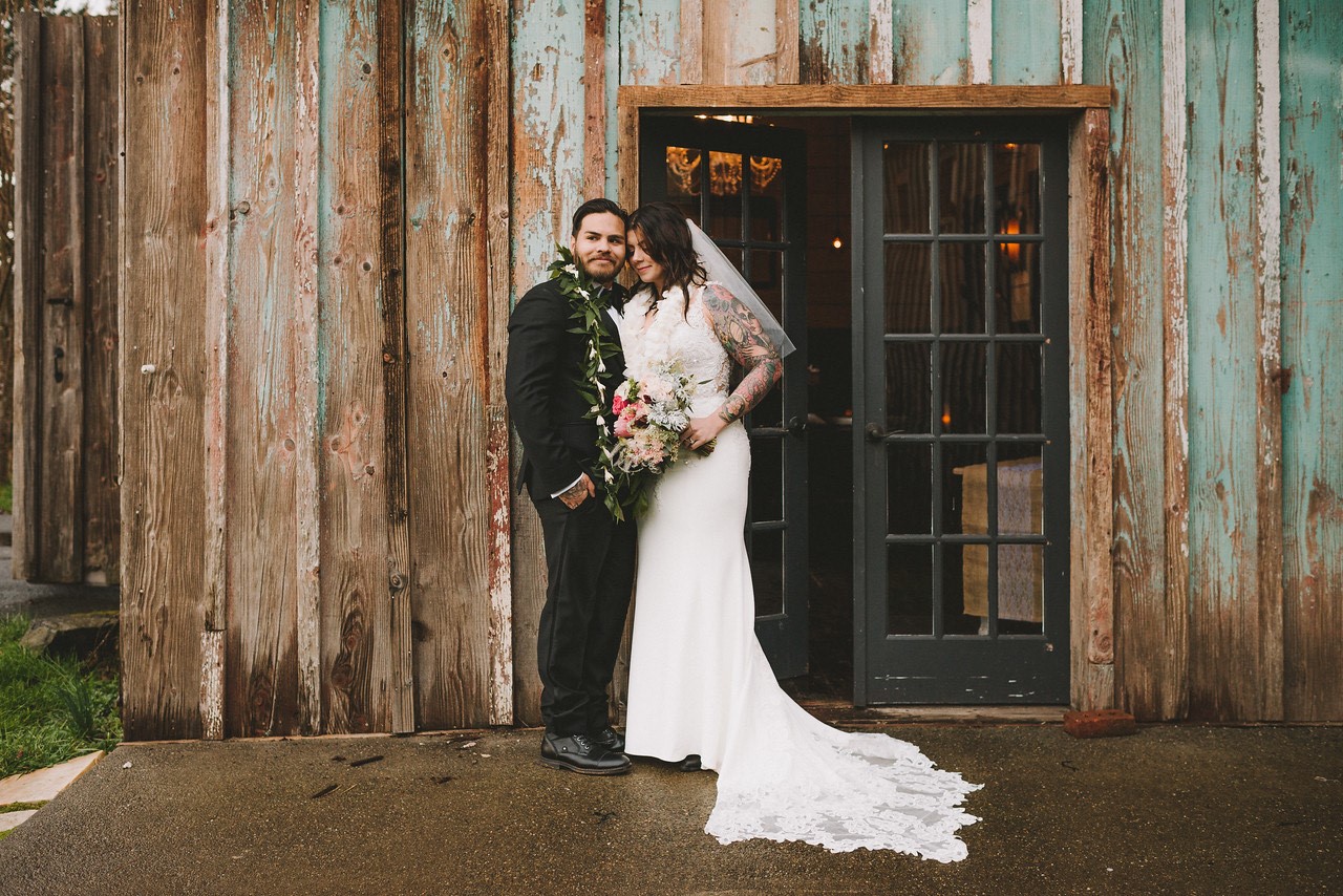 Groom With Real Bride Wearing Beaded Sheath Wedding Dress Called Alaina By Maggie Sottero 