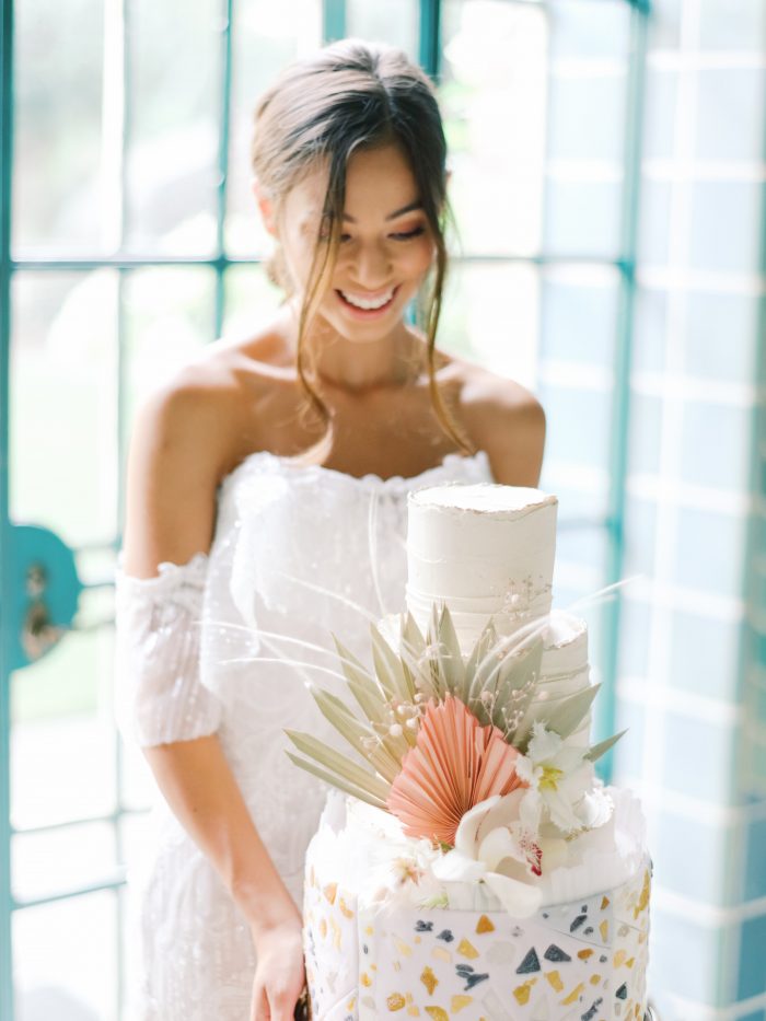Real Bride Holding Modern Bohemian Wedding Cake