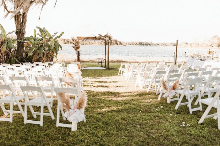 Outdoor Wedding Decor and Ceremony Set Up for Lakeside Wedding