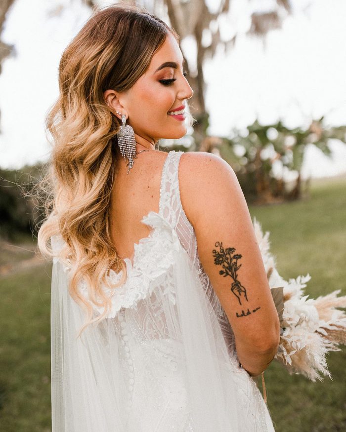 Bride Wearing Maggie Sottero Wedding Dress Called Elaine with a Bridal Cape
