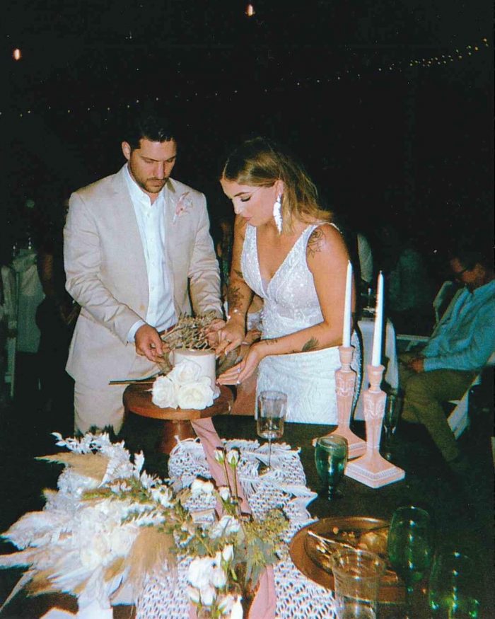 Bride and Groom Cutting a Gluten-Free DIY Wedding Cake at Affordable Outdoor Wedding