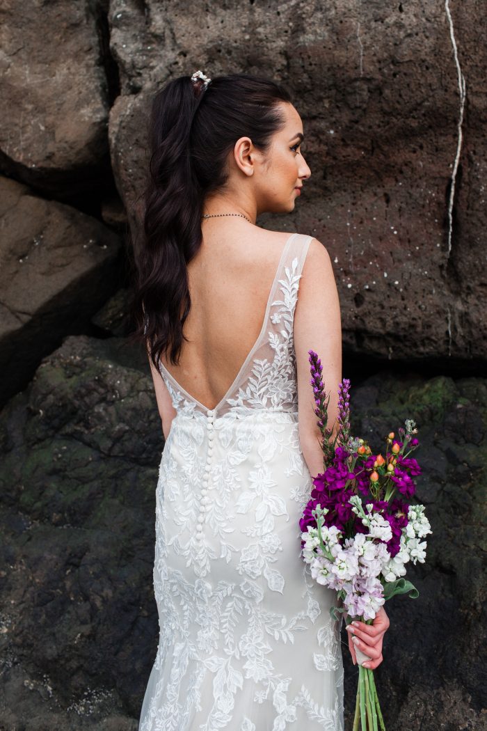 Bride From Back Wearing V-back Beach Wedding Dress by Maggie Sottero and Slicked-back Ponytail