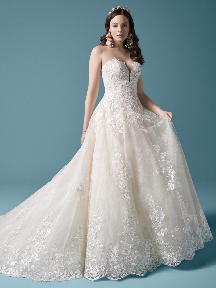 Model Wearing Sparkly Lightweight Ball Gown Wedding Dress Called Tennyson by Maggie Sottero