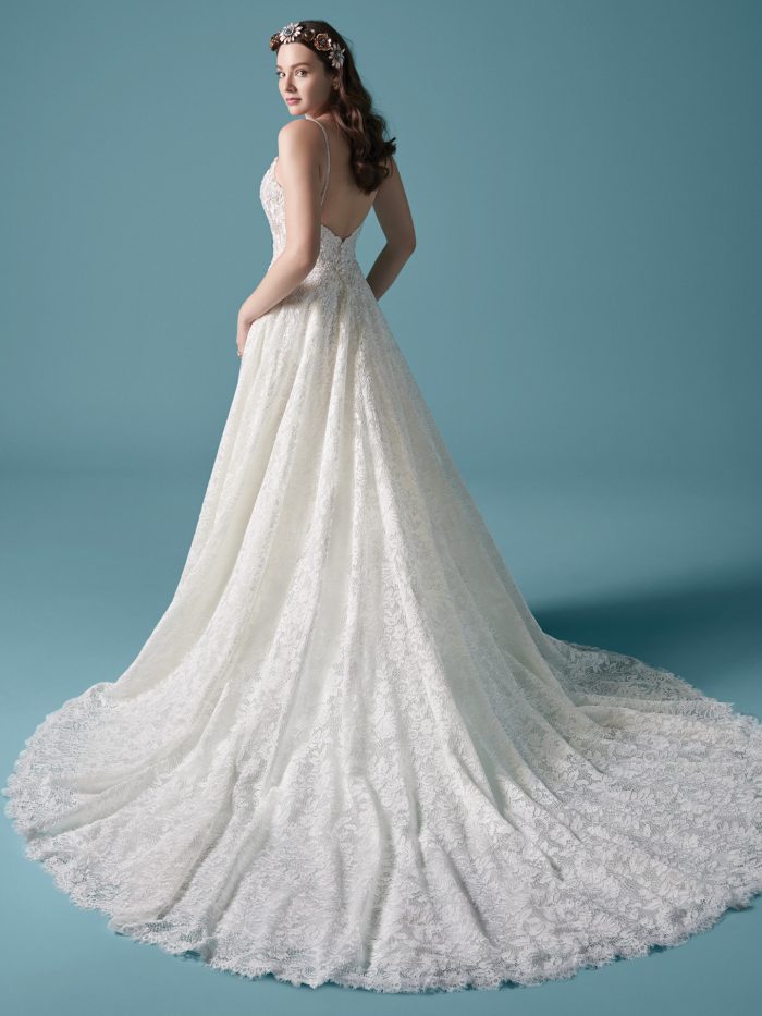 Model Wearing Lace Ball Gown Wedding Dress Called Valentia by Maggie Sottero