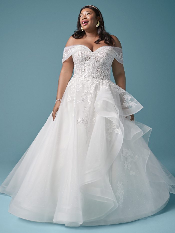 Plus Size Model Wearing Curvy Princess Wedding Dress Called Zariah by Maggie Sottero