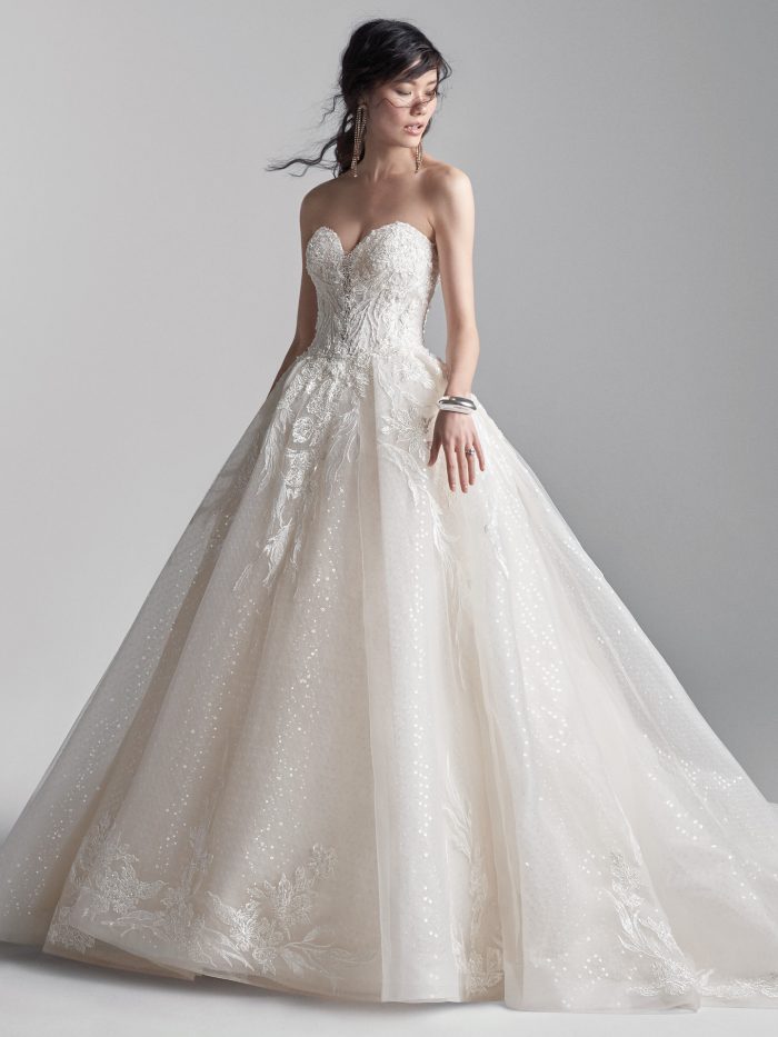 Model Wearing Strapless Tulle Ball Gown Wedding Dress Called Troy by Sottero and Midgley