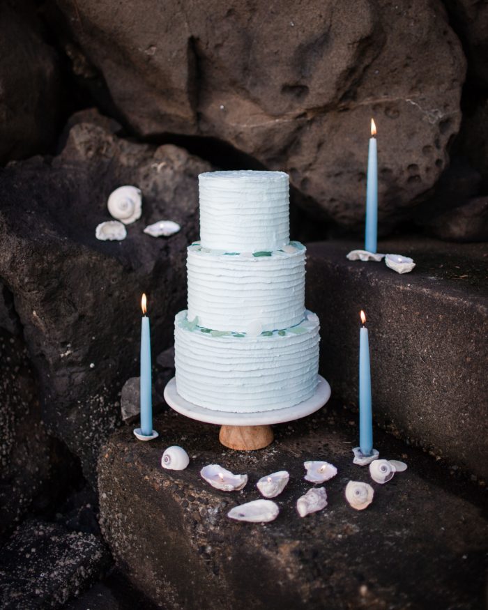 Blue Beach Wedding Cake with Blue Candles and Seashells