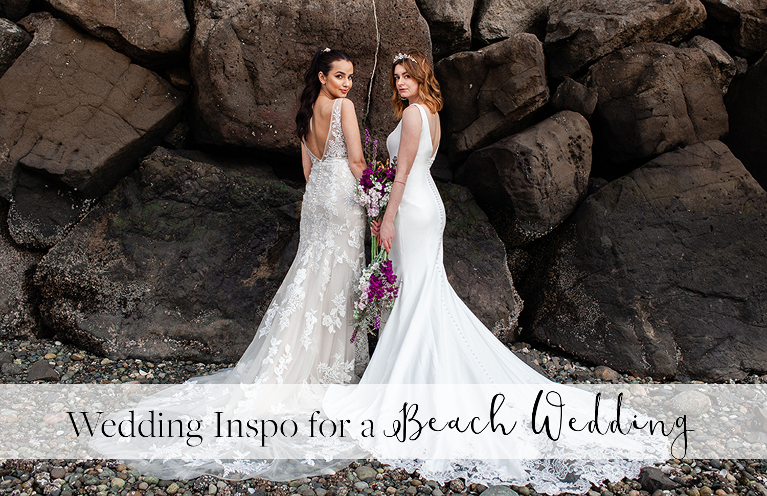 Two Models Standing by Each Other on Beach Wearing Beach Wedding Dresses by Maggie Sottero