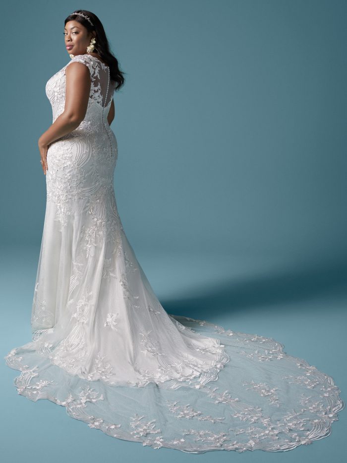 Plus Size Bride Wearing Plus Size Cap-sleeve Boho Wedding Dress Called Keenan Lynette by Maggie Sottero