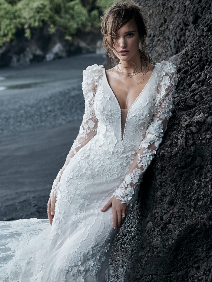 Bride on Beach Wearing Puff Sleeve Wedding Dress with 3-D Lace Floral Motifs Called Cruz by Sottero and Midgley