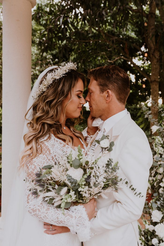 Groom with Bride Wearing Boho Flower Crown with Soft Waves