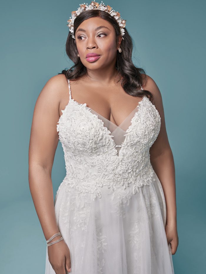 Plus Size Model Wearing Boho Tulle A-line Wedding Gown Called Roanne by Maggie Sottero