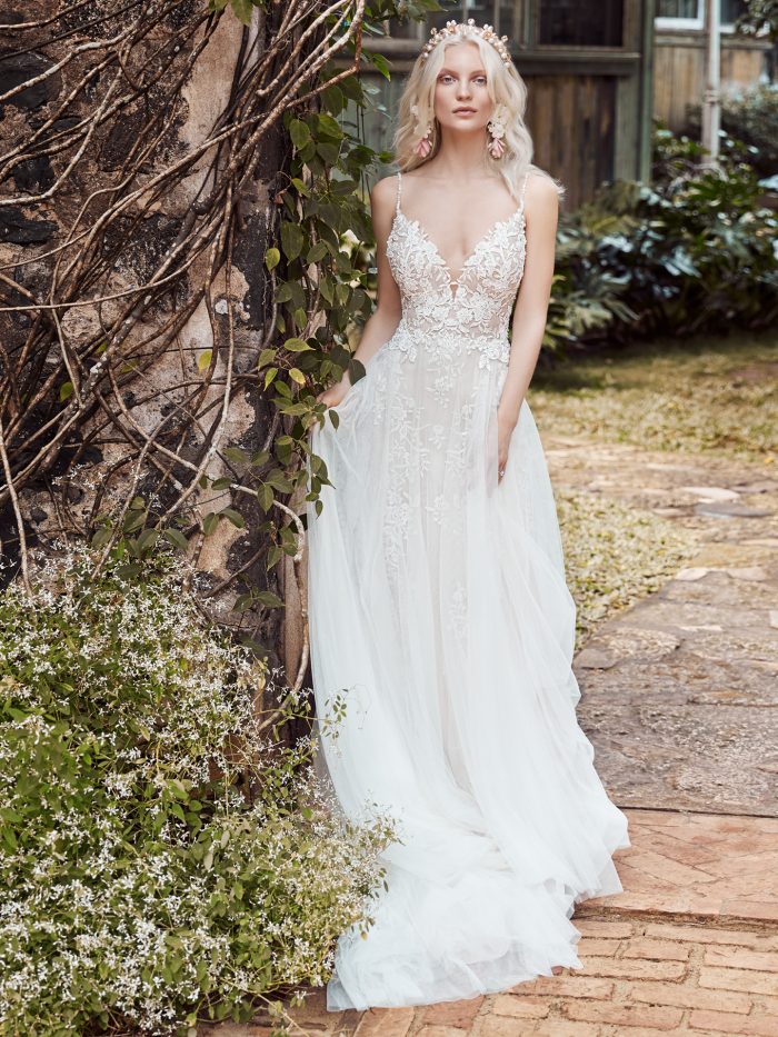 Model Wearing Boho A-line Wedding Dress with Sheer Bodice Called Roanne Rose by Maggie Sottero