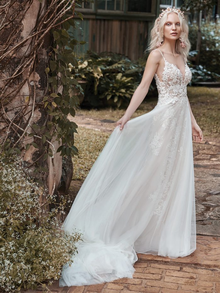 Model Wearing Boho A-line Wedding Dress with Sheer Bodice Called Roanne Rose by Maggie Sottero