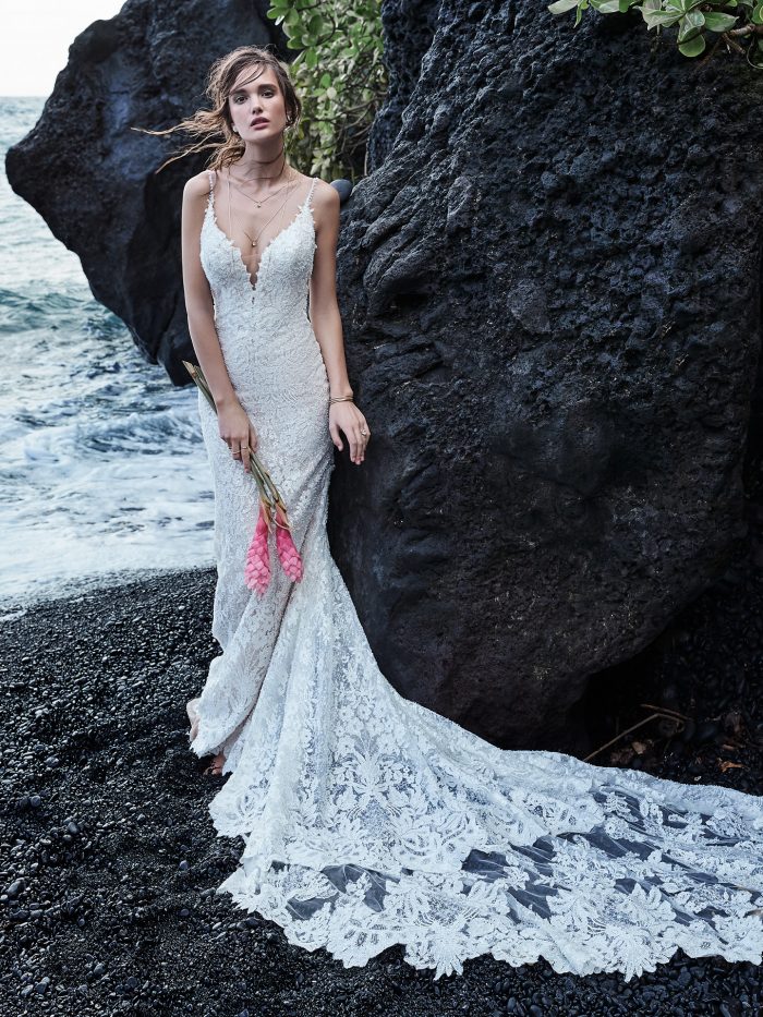 Model on Beach Wearing Sexy Floral Sheath Wedding Dress with Long Train Called Canterbury Marie by Sottero and Midgley
