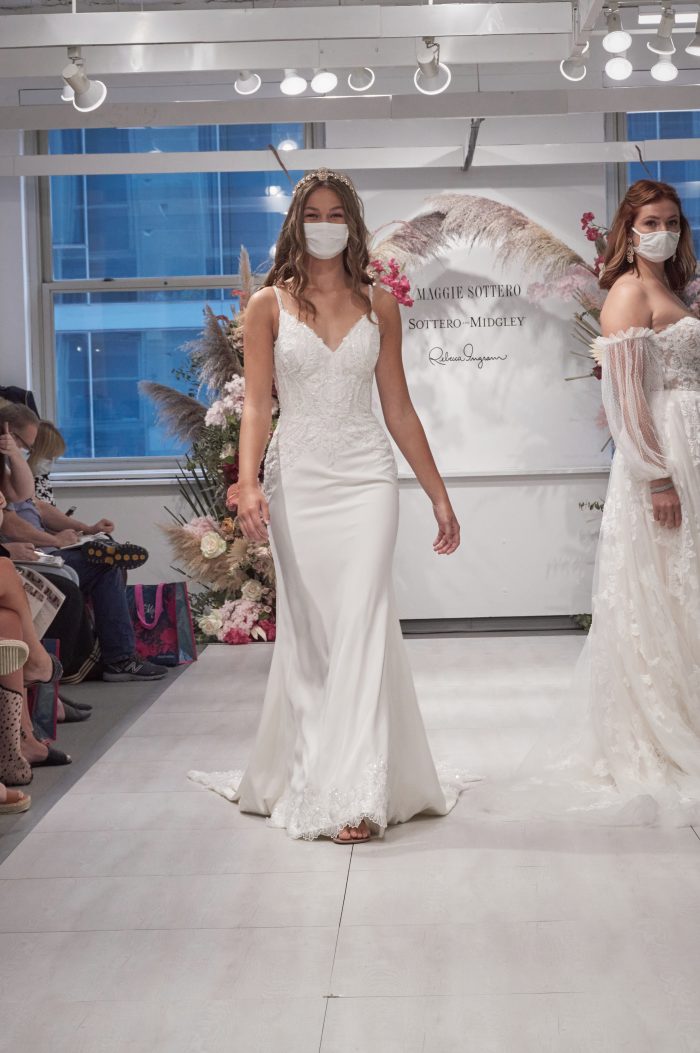 Model Walking Down the Runway at Chicago Bridal Market and Wearing V-neck Wedding Dress Called Copeland by Sottero and Midgley