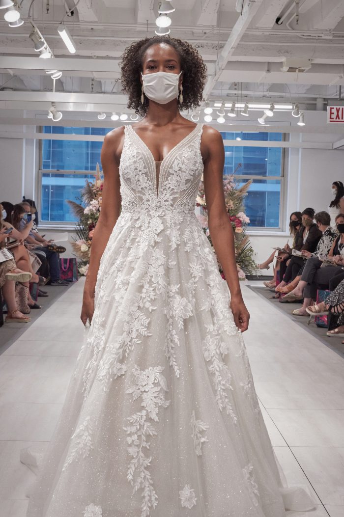 Model Wearing Geometric A-line Wedding Dress Called Essex at the 2021 Chicago Bridal Market
