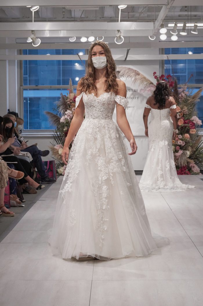 Model Wearing Favorite Wedding Dress with Off-the-Shoulder Sleeves by Maggie Sottero at Chicago 2021 Bridal Market