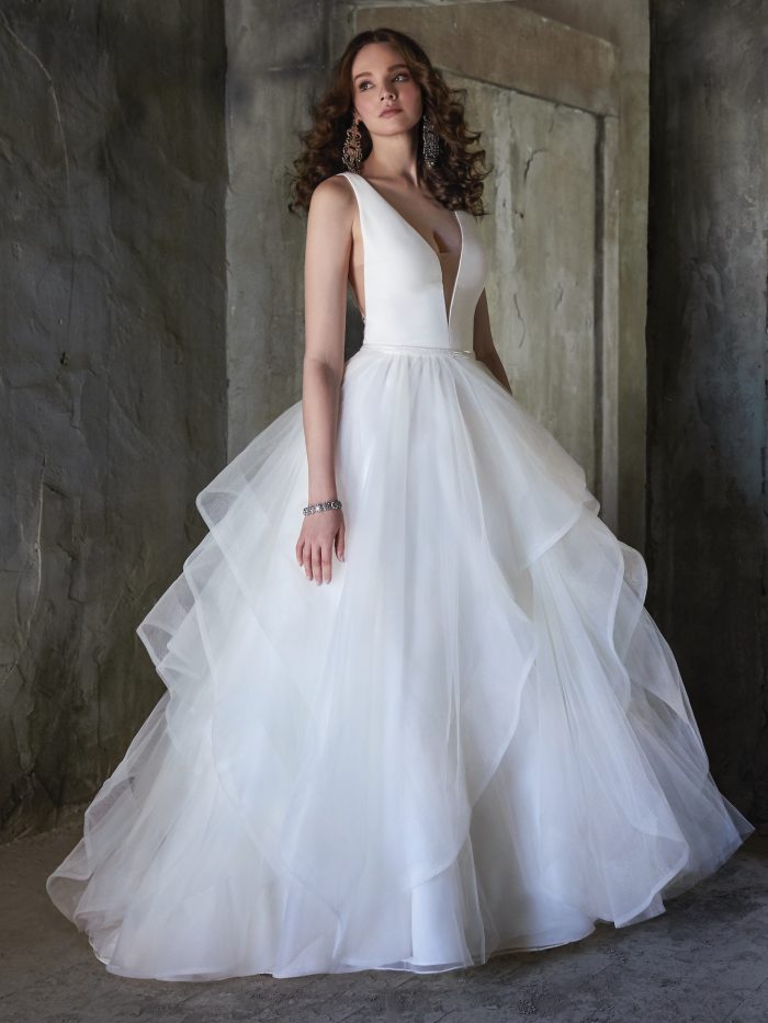 Bride Wearing Simple Ball Gown Wedding Dress Called Fatima by Maggie Sottero