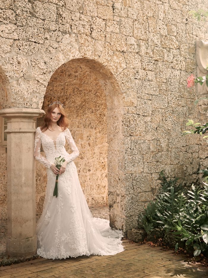 Model Wearing Sleeved Lace A-line Wedding Dress Called Johanna by Maggie Sottero