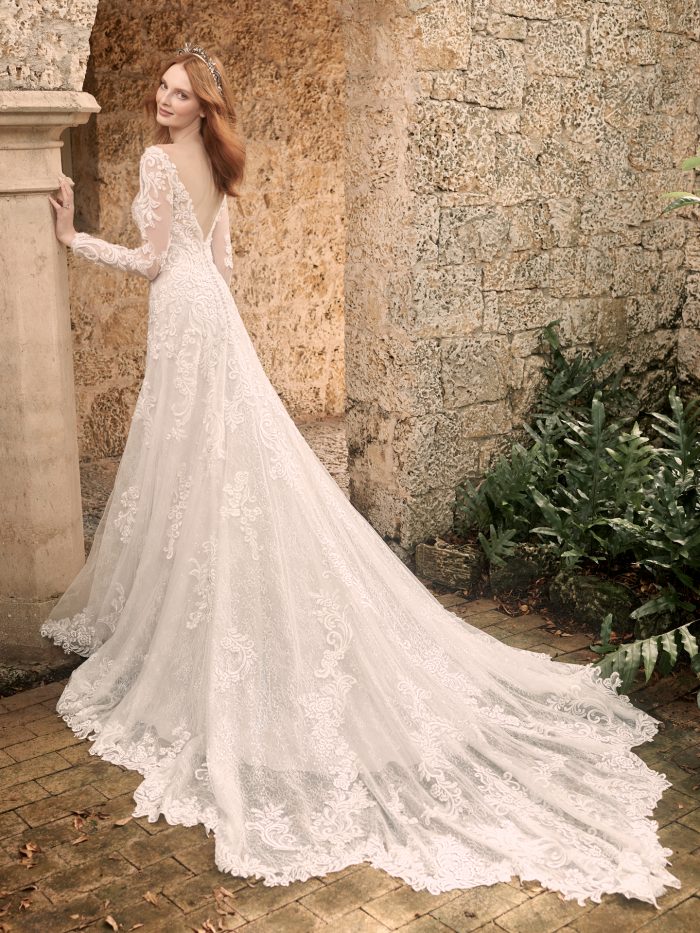 Model Wearing Gorgeous Lace Wedding Dress with Extended Train Called Johanna by Maggie Sottero