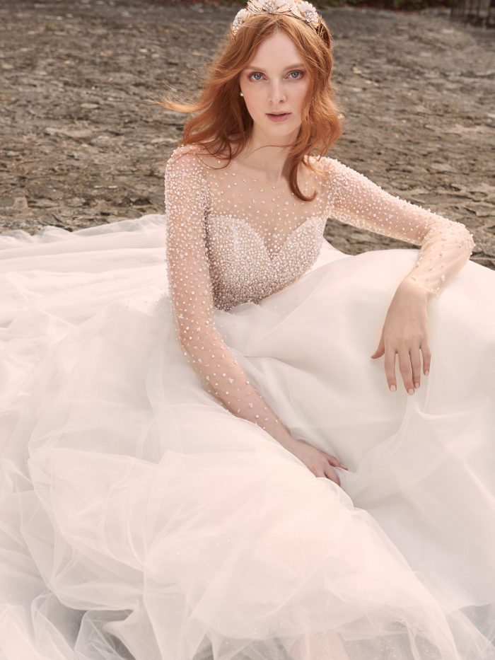 Model Wearing Long Sleeve Pearl Ball Gown Wedding Dress Called Rosette by Maggie Sottero