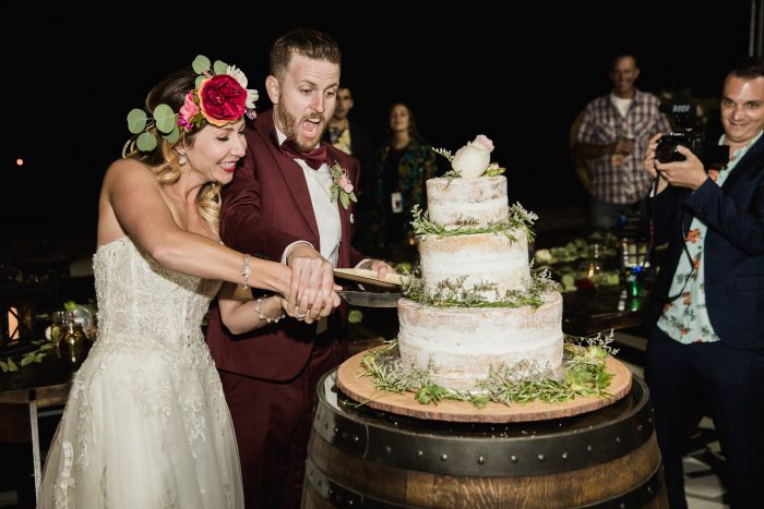 Groom with Real Bride Cutting Naked Wedding Cake at Festival Wedding