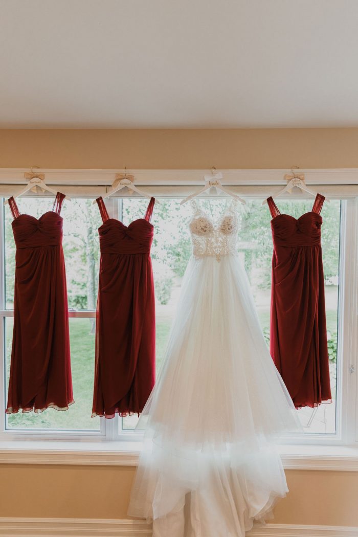 Red Bridesmaids Dresses with Ball Gown Wedding Dress by Maggie Sottero