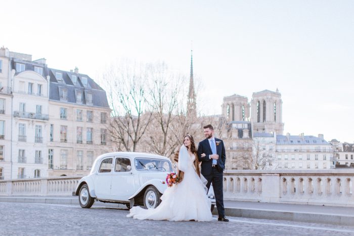 Groom with Real Bride in Paris France Wearing Layered Ball Gown Wedding Dress by Sottero and Midgley
