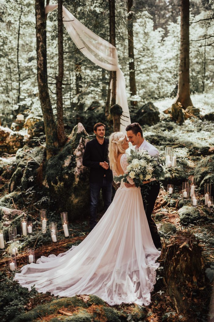 Groom with Bride at Mountain Resort in Slovenia for Romantic Destination Wedding