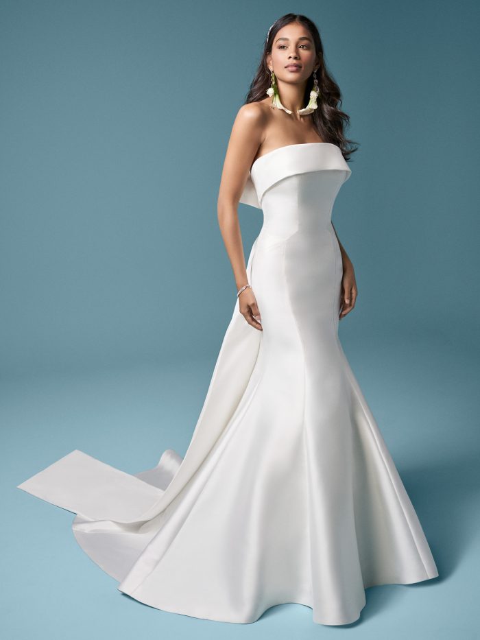 Model Wearing Unique Satin Bridal Dress with Bow in Back Called Mitchel by Maggie Sottero