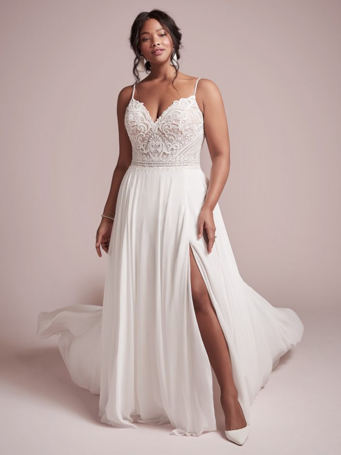 Curvy Model Wearing Plus Size Beach Chiffon Wedding Gown Called Lorrained by Rebecca Ingram
