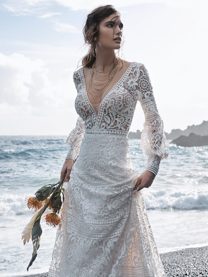 Bride on Beach Wearing V Neck Wedding Dress Called Finley By Sottero And Midgley