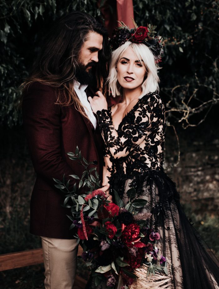 Groom with Bride Wearing Gothic Wedding Makeup Look and Zander Black Wedding Dress by Sottero and Midgley