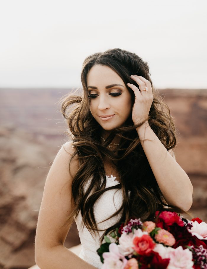 Bride at Dead Horse Point Bridal Wearing Romantic Wedding Makeup Look with Rebecca Ingram Wedding Gown
