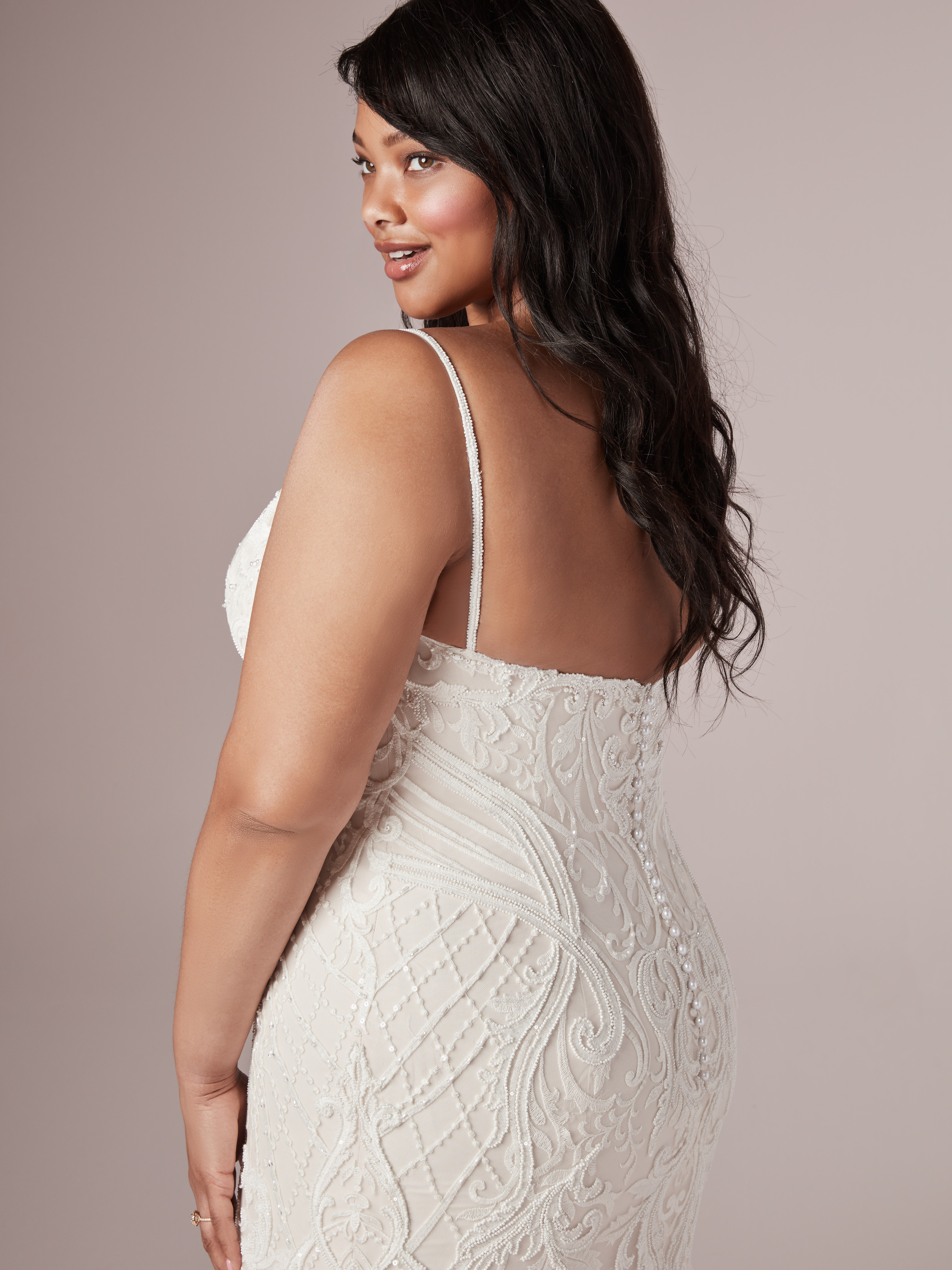 Plus Size Model From Back Wearing Beach Sheath Wedding Dress Called Corrine by Rebecca Ingram