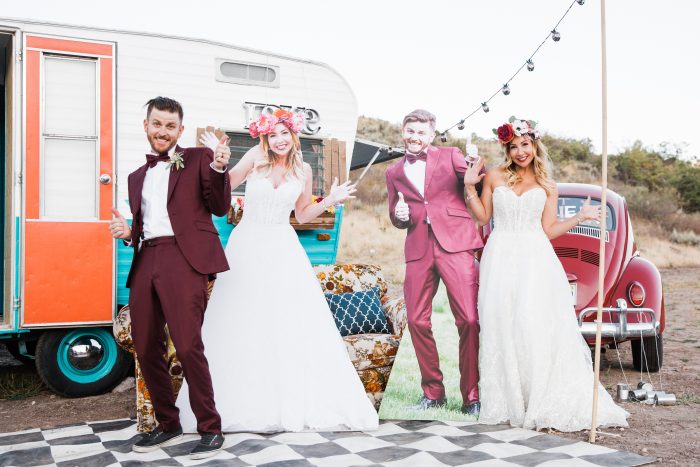 Boho Bride and Groom Standing With Cardboard Cutouts of Bride and Groom at Real Wedding