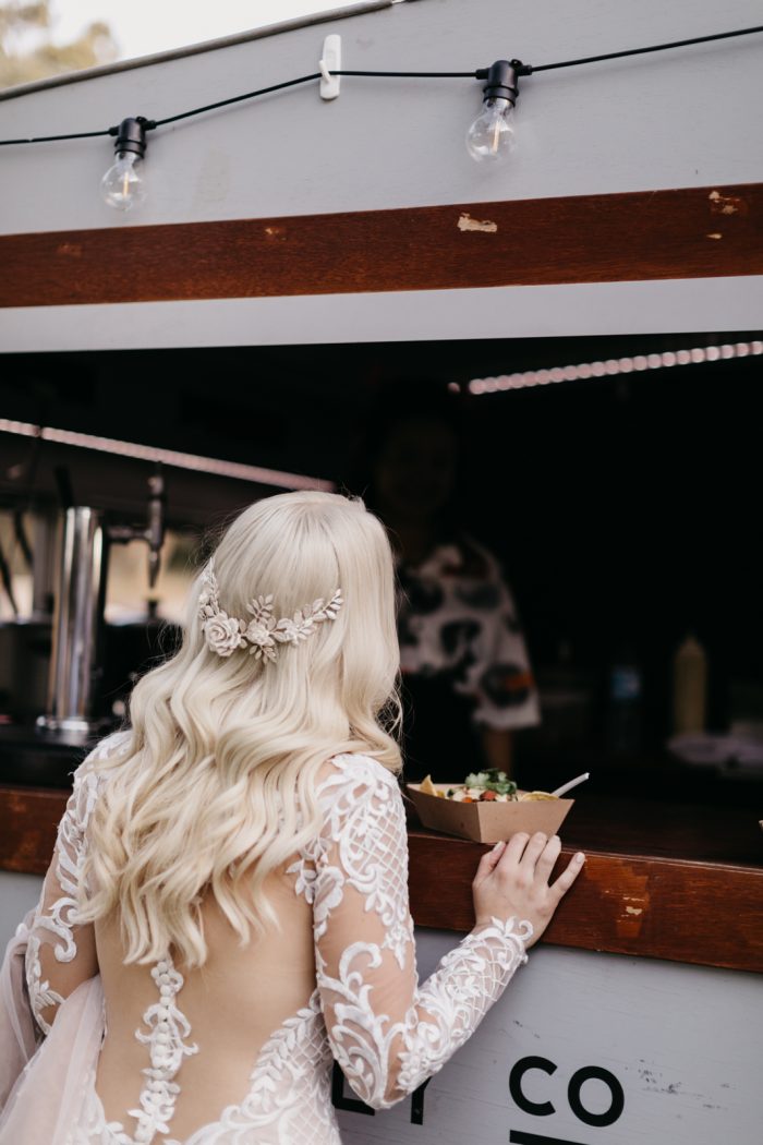 Bride Ordering Tacos from Food Truck at Real Wedding