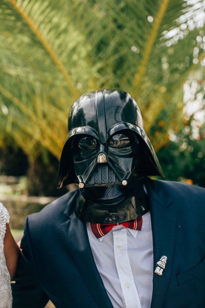 Groom Dressed up with Darth Vader Helmet