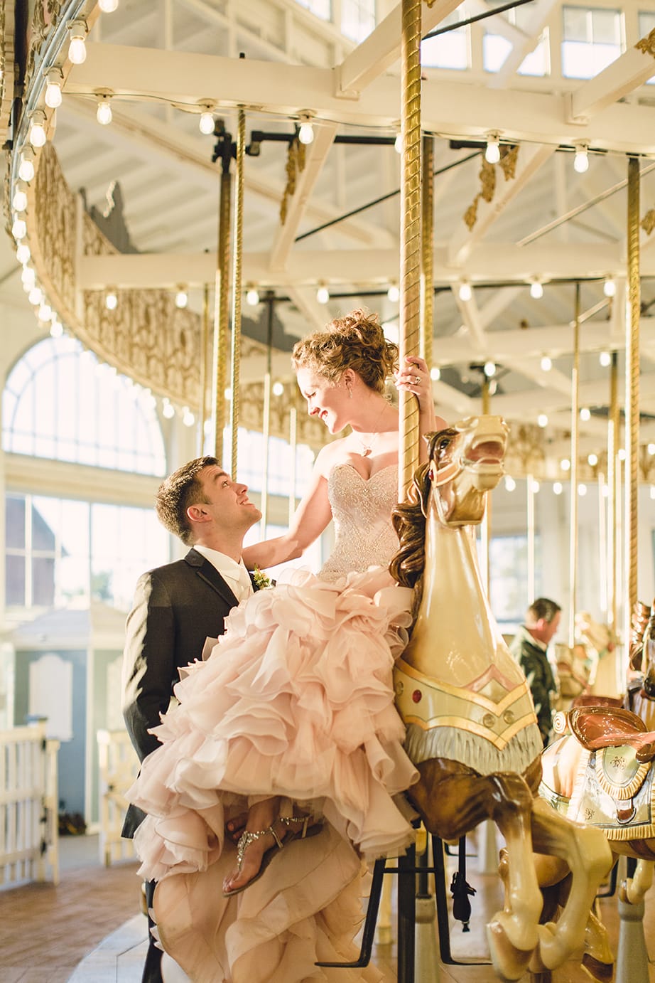 Blush Wedding Dress at Carnival-Themed Wedding - Maggie Bride wearing Serencia by Maggie Sottero